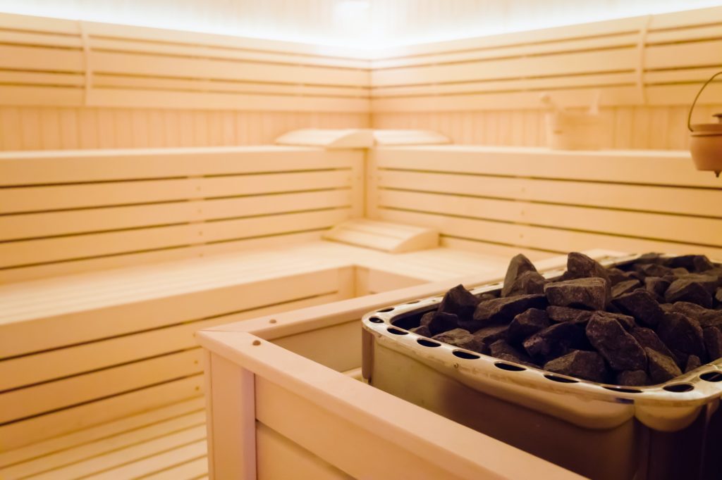 Beautiful sauna interior with stones