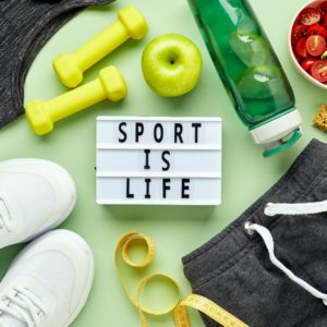 Creative flat lay of sport and fitness equipments.