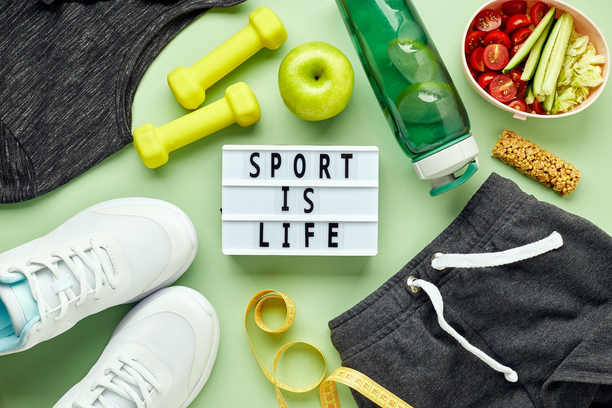 Creative flat lay of sport and fitness equipments.